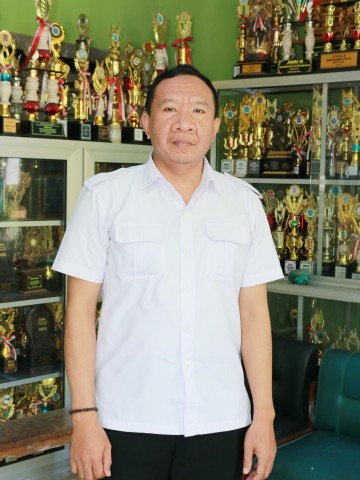 Gd. Nengah Aris Priatmaja, S.E., S.Pd.